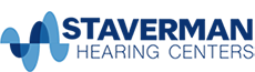 Logo for Staverman Hearing Centers. The image features a blue soundwave graphic to the left of the bold text STAVERMAN HEARING CENTERS written in blue capital letters on a light background.